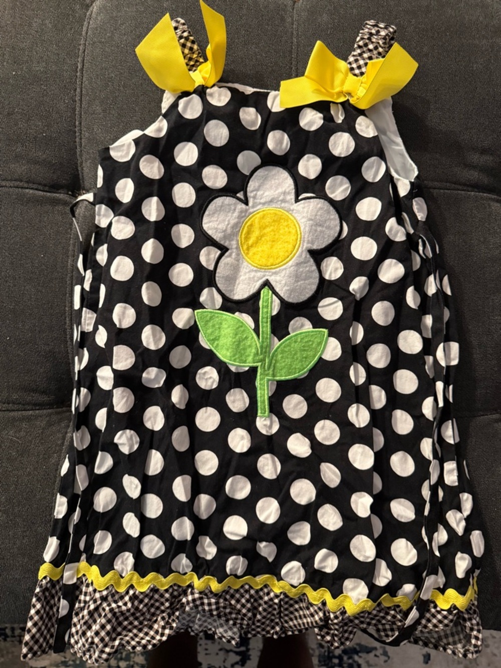 Girls Black & White Polka Dot Dress with Yellow Flower Accent